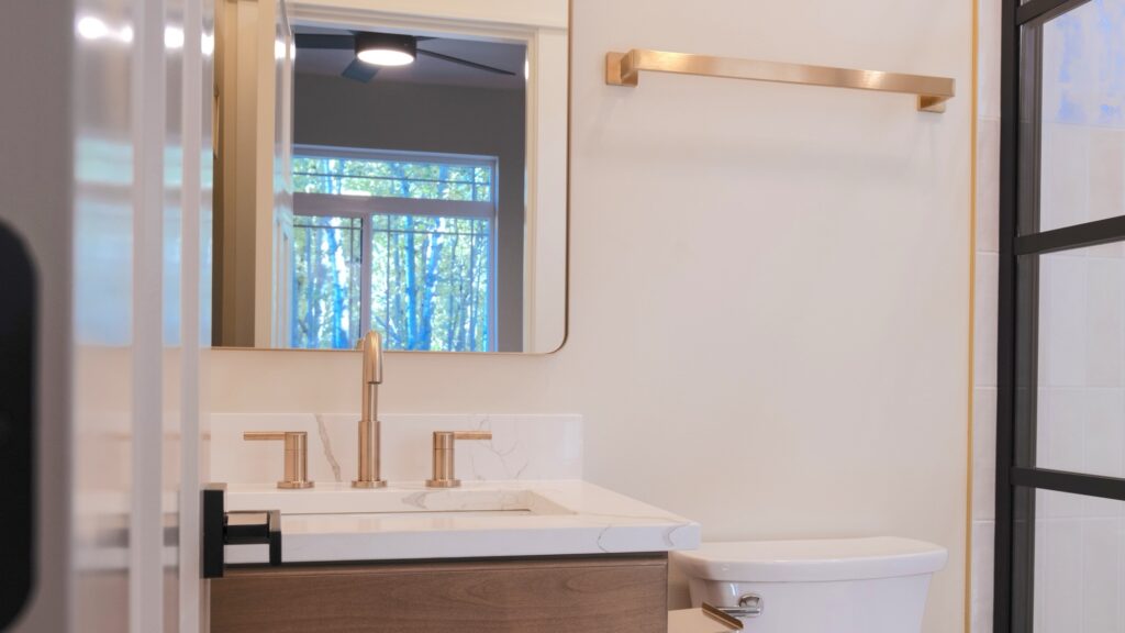 Alpenglow Builders LLC - A high-end custom bathroom interior with modern fixtures, natural light, and elegant design by Alpenglow Builders in Palmer a.