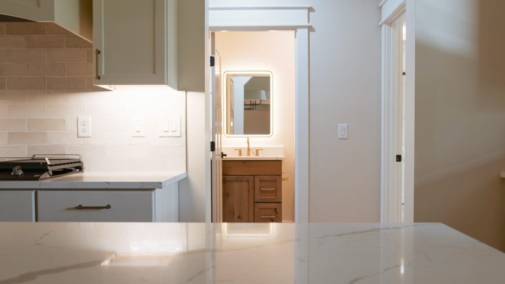 Alpenglow Builders LLC - Alpenglow Builders LLC luxury home interior in Palmer, Alaska, showcasing modern kitchen and bathroom design.