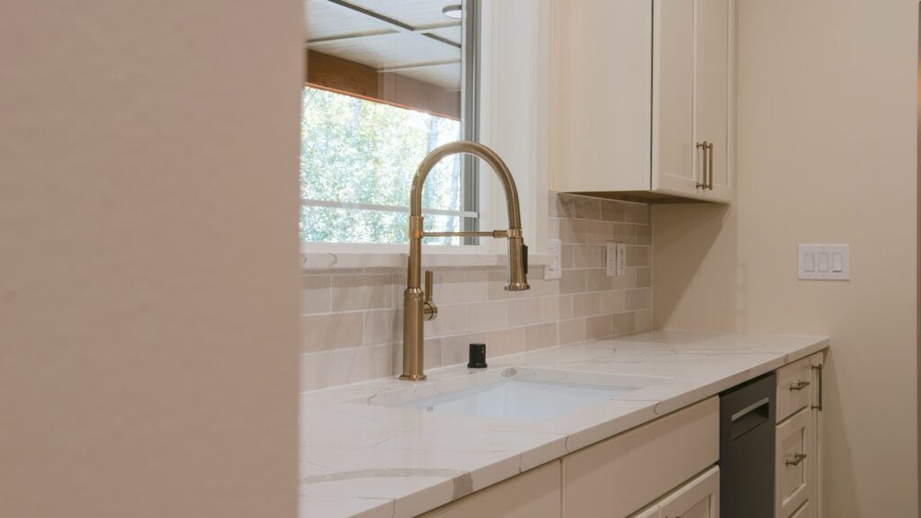 Alpenglow Builders LLC - A high-end custom kitchen in a luxury home built by Alpenglow Builders in Palmer, Alaska, featuring modern design and premium.