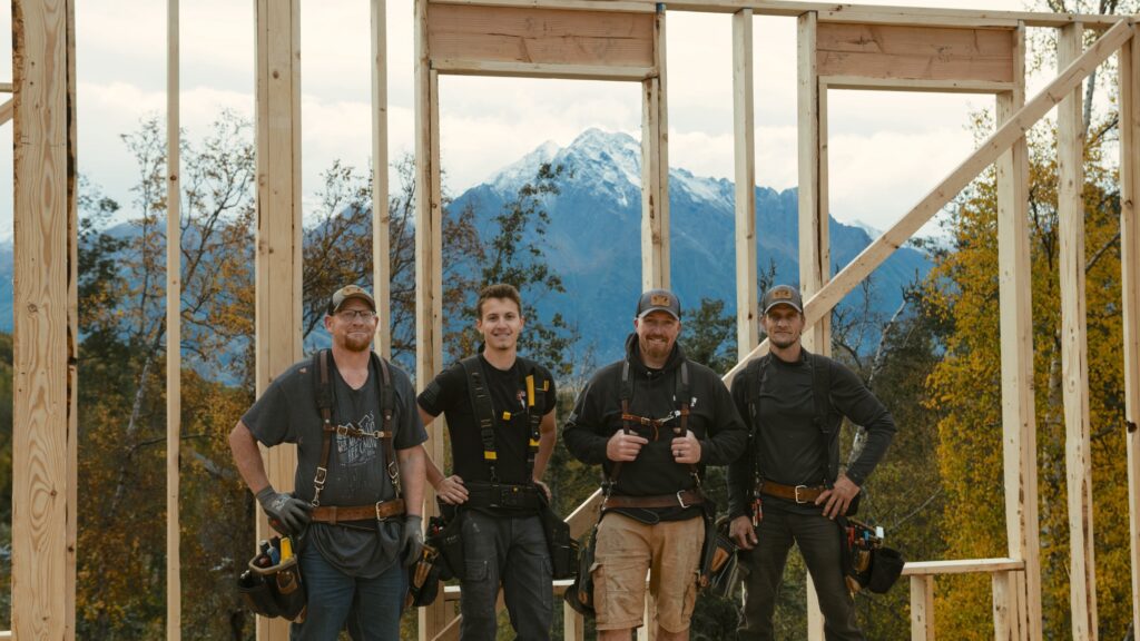 Alpenglow Builders LLC - Alpenglow Builders LLC custom luxury home construction team in Palmer and Wasilla, Alaska, with mountain views in the backgro.