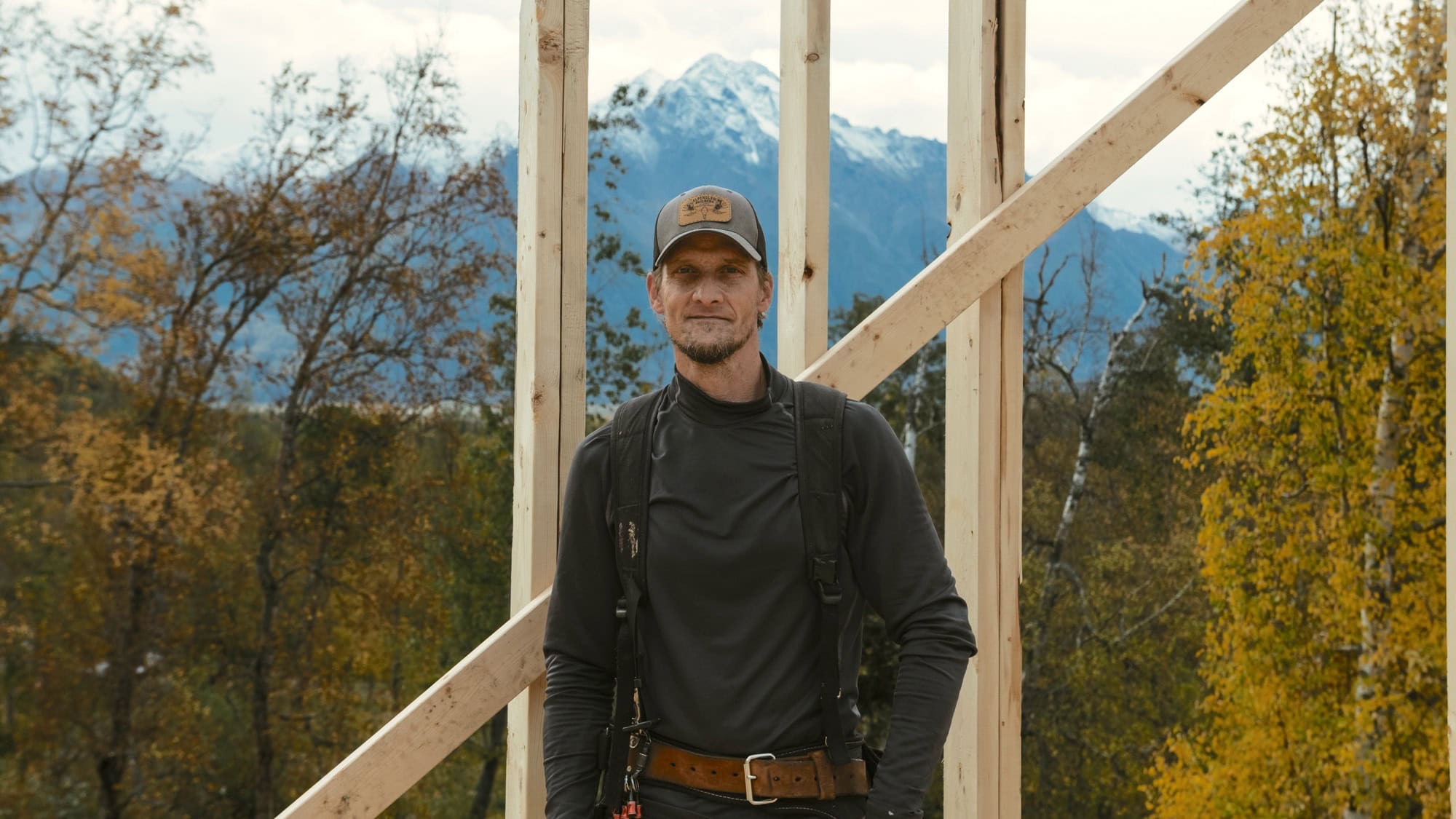 Alpenglow Builders LLC - Alpenglow Builders LLC luxury home under construction in Palmer, Alaska, with mountain views and autumn foliage.